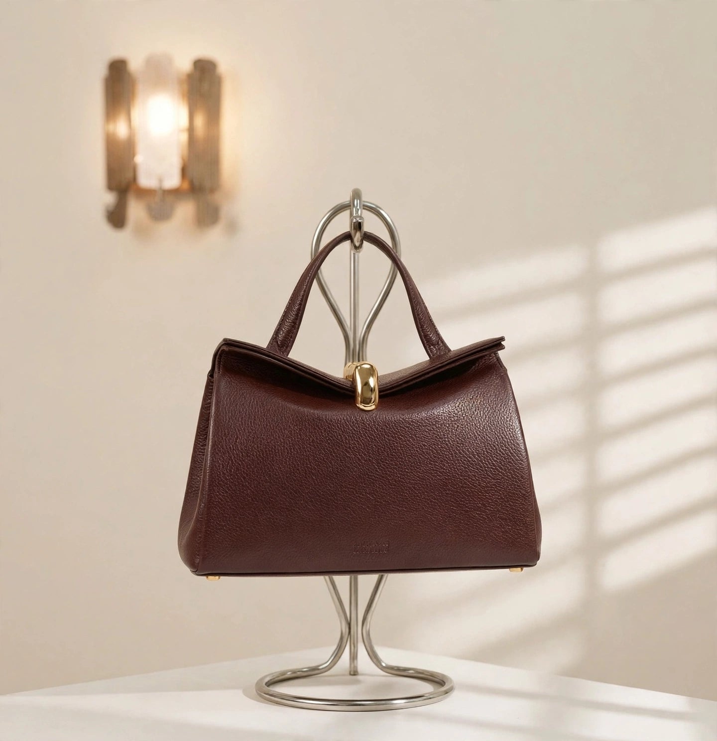 Edda Minimalist Lock Satchel